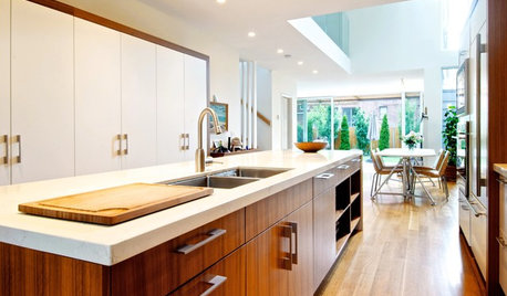 See How Wood Warms Modern White Kitchens