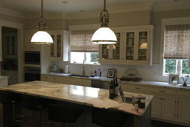 Kitchen - large modern galley brown floor kitchen idea in Houston with a single-bowl sink