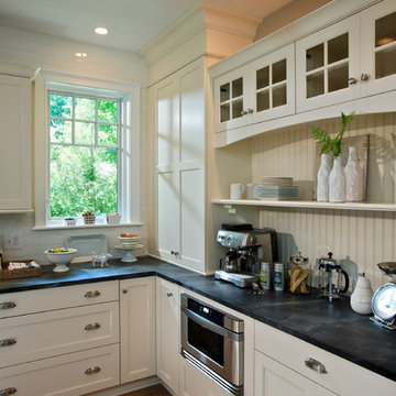 Kitchen with Antique White Cabinets and Soapstone Countertops