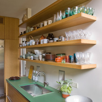 kitchen with bamboo cabinets and resin countertops
