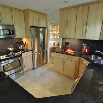 Kitchen with Black Granite Countertops