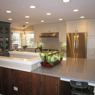 Kitchen with Blue Cabinets Features Unique Layout