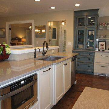 Kitchen with Blue Cabinets Features Unique Layout