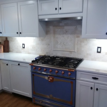 Kitchen with Blue La Cornue Stove
