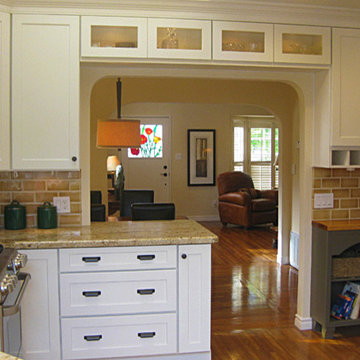 Kitchen with cabinets over doorway