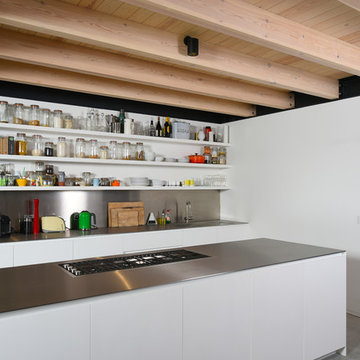 Kitchen with Corian fronts and stainless steel tops