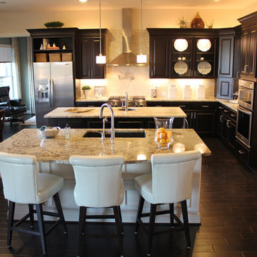 Kitchen with double island by Burrows Cabinets