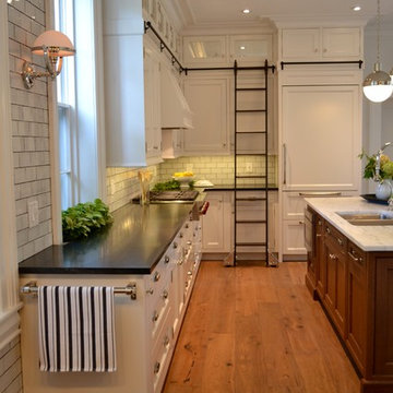 Kitchen with Double Row of Upper Cabinets with Glass Doors on Top