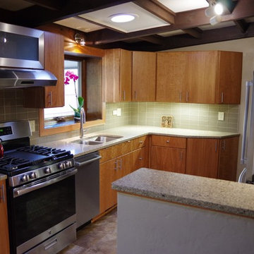 Kitchen with Flat Panel Cherry Cabinets