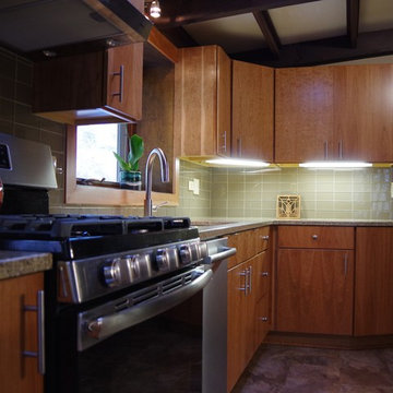 Kitchen with Flat Panel Cherry Cabinets