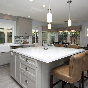 Kitchen with gray cabinets & Cambria countertops