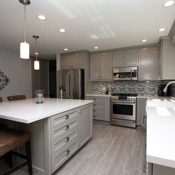 Kitchen with gray cabinets & Cambria countertops
