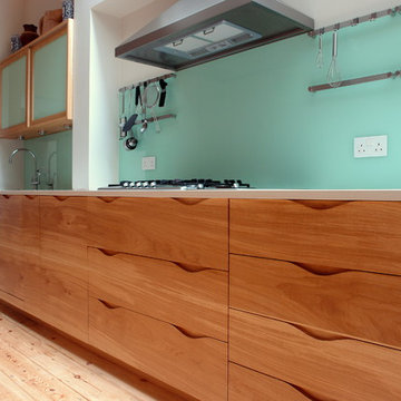 Kitchen with horizontal Oak fronts.