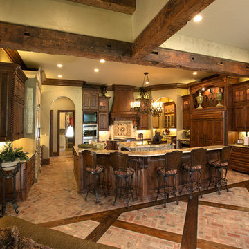 Kitchen with inlaid wood in brick floor