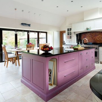 Kitchen with large Island in painted plum finish