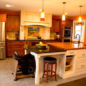 Kitchen With Mantle Styled Wood Hood
