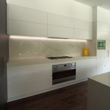 kitchen with overhead lift up cupboards & led lights