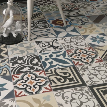 Kitchen with Patchwork Spanish Inspired Floor Tiles