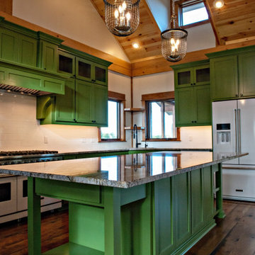 Kitchen with shiplap ceiling, custom green cabinets, large island