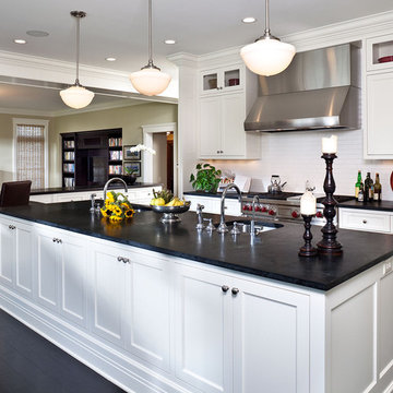 Kitchen with Soapstone countertops and Ebonized wood floors