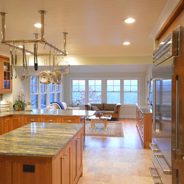 Kitchen with view of family room and outdoors