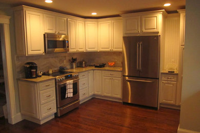 Trendy dark wood floor kitchen photo in Boston