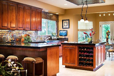 Example of a mid-sized l-shaped eat-in kitchen design in San Diego with beaded inset cabinets, dark wood cabinets, onyx countertops, brown backsplash, mosaic tile backsplash and an island
