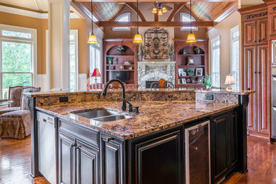 Inspiration for a large timeless medium tone wood floor open concept kitchen remodel in Atlanta with medium tone wood cabinets, granite countertops, stainless steel appliances and an island