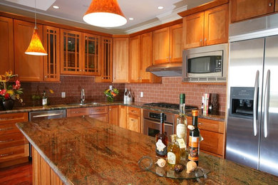 Kitchen - mid-sized transitional l-shaped medium tone wood floor and brown floor kitchen idea in Hawaii with a double-bowl sink, shaker cabinets, medium tone wood cabinets, brown backsplash, subway tile backsplash, stainless steel appliances and an island