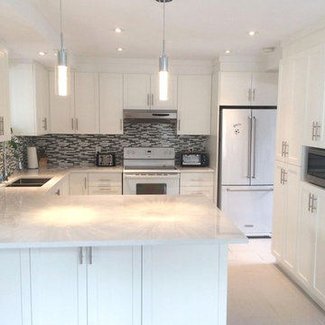 White kitchen in Longueuil, Quebec