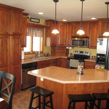 KITCHENS DONE WITH ALDER CABINETS