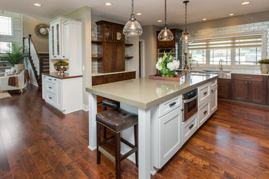 Traditional u-shaped open plan kitchen in Other.