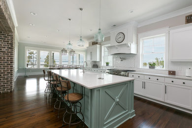 Example of a trendy kitchen design in Charleston with quartz countertops