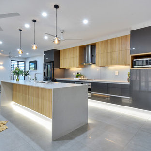 Design ideas for a contemporary galley open plan kitchen in Darwin with a drop-in sink, flat-panel cabinets, grey cabinets, grey splashback, with island, grey floor and grey benchtop.