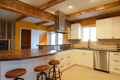 Example of a country kitchen design in Edmonton
