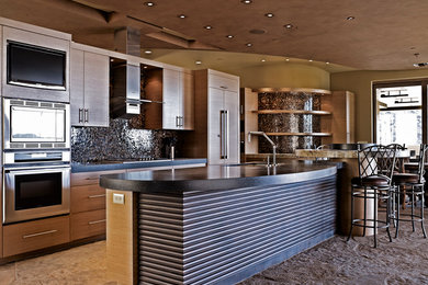 Eat-in kitchen - large contemporary l-shaped terrazzo floor and brown floor eat-in kitchen idea in Phoenix with an undermount sink, flat-panel cabinets, medium tone wood cabinets, concrete countertops, metallic backsplash, mosaic tile backsplash, paneled appliances and an island