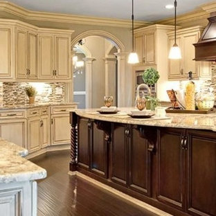 Design ideas for a traditional l-shaped eat-in kitchen in Boise with a double-bowl sink, shaker cabinets, light wood cabinets, granite benchtops, white splashback, stone slab splashback, stainless steel appliances, slate floors, with island and multi-coloured floor.
