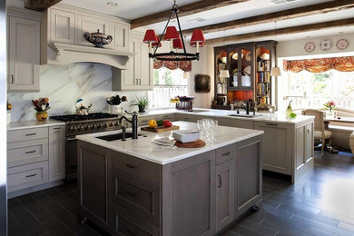 Eat-in kitchen - country l-shaped dark wood floor eat-in kitchen idea in Boise with a double-bowl sink, shaker cabinets, light wood cabinets, granite countertops, white backsplash, stone slab backsplash, stainless steel appliances and an island