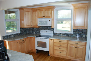 Kraftmaid kitchen and cashmere white granite