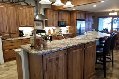 Cottage galley kitchen photo in Other with an island