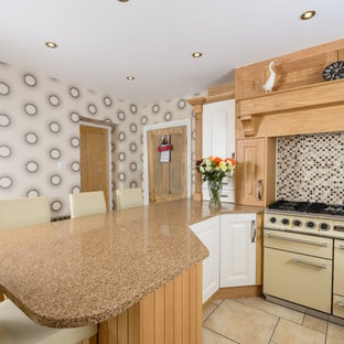 Design ideas for a traditional kitchen in Manchester with mosaic tile splashback, white appliances and brown splashback.