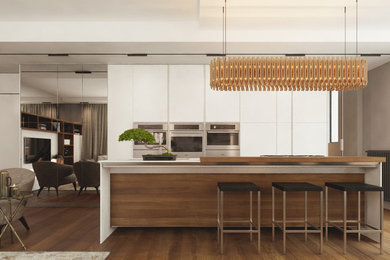 Example of a mid-sized trendy single-wall dark wood floor eat-in kitchen design in Other with flat-panel cabinets, beige cabinets, quartzite countertops and an island