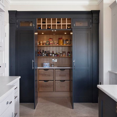 Example of a large transitional u-shaped ceramic tile eat-in kitchen design in Belfast with an undermount sink, beaded inset cabinets, gray cabinets, quartzite countertops, gray backsplash, stone slab backsplash, stainless steel appliances and an island