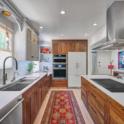 Eat-in kitchen - mid-sized contemporary l-shaped light wood floor and multicolored floor eat-in kitchen idea in Sacramento with an undermount sink, shaker cabinets, medium tone wood cabinets, quartz countertops, white backsplash, porcelain backsplash, stainless steel appliances, a peninsula and white countertops