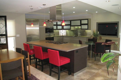 Inspiration for a contemporary kitchen in Orange County with an island.