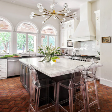Lake Austin Kitchen with White Cabinets, Black Island