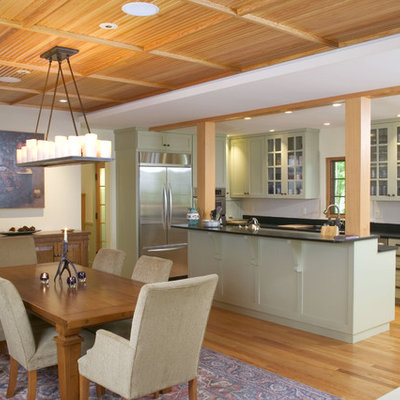 Elegant galley eat-in kitchen photo in Boston with stainless steel appliances