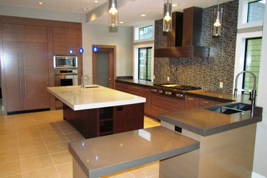 Mid-sized minimalist l-shaped ceramic tile eat-in kitchen photo in Seattle with a double-bowl sink, medium tone wood cabinets, gray backsplash, ceramic backsplash and stainless steel appliances