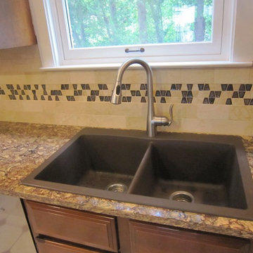 Large Double Sink and Fiery Quartz Countertops