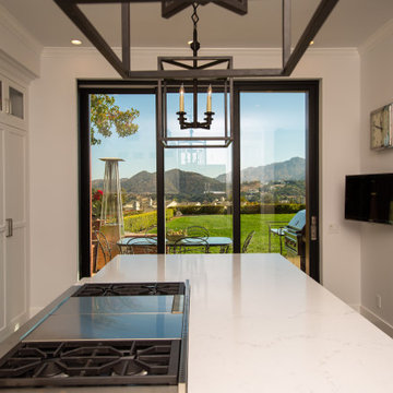 Large Sliding Glass Doors Create an Open-Air Kitchen